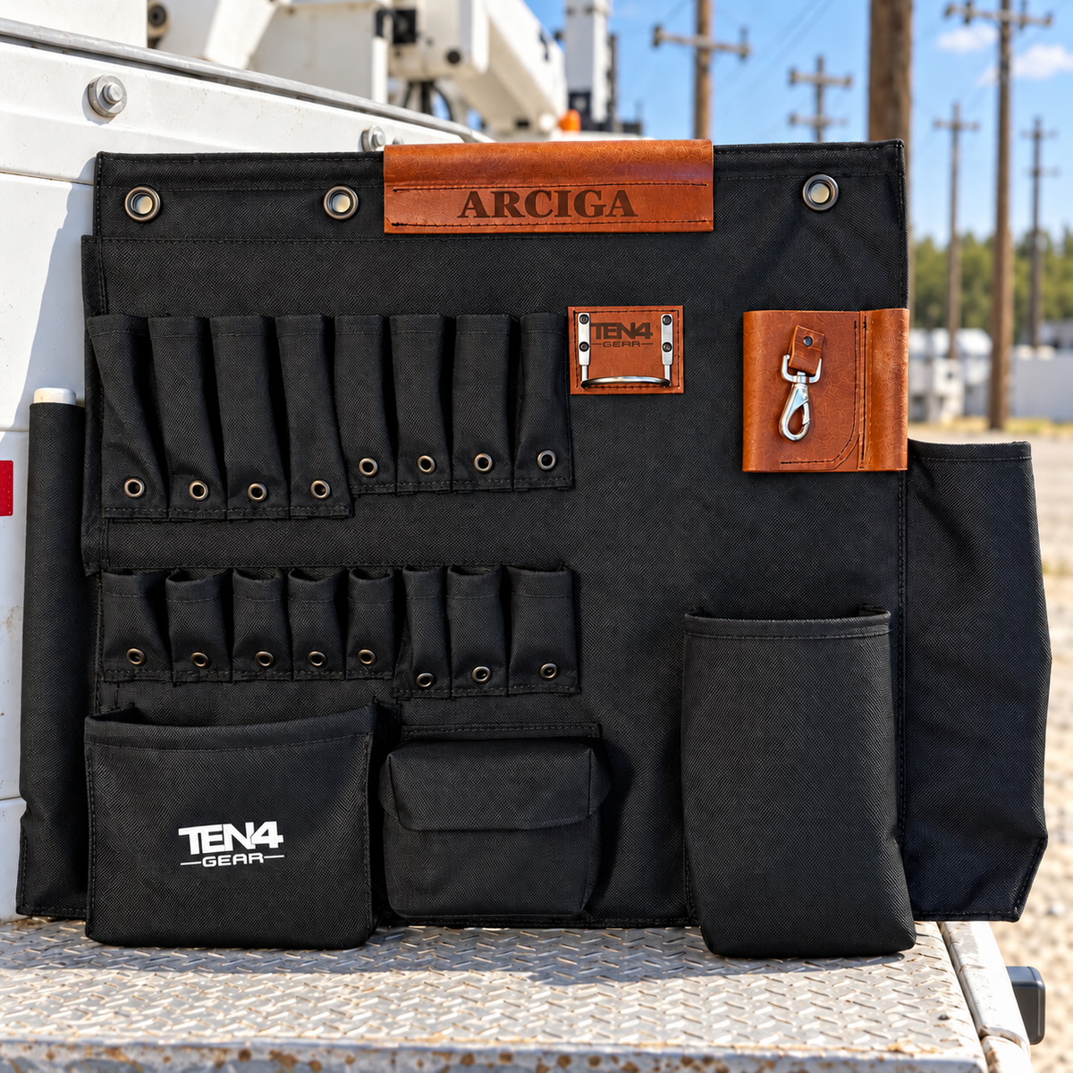 Black 32 in TEN4 Toolboard, non-lighted version with original pocket layout and woven fabric texture.