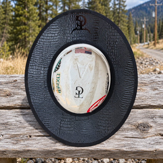 BlackWater gator sunshade on an outdoor bench beside a powerline right-of-way