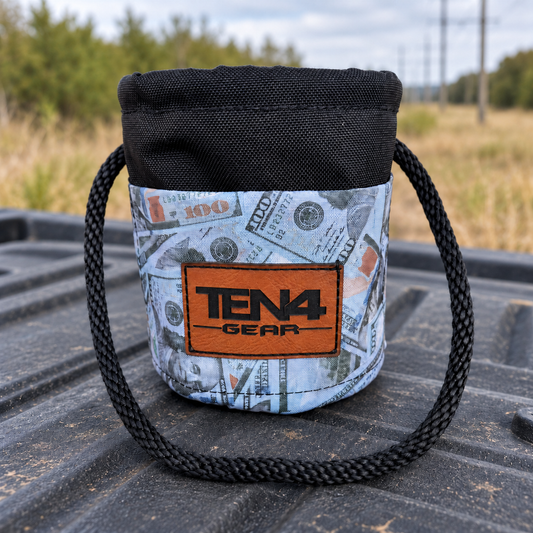 Blue Strips Grunt Sack resting on a truck tailgate at a rural utility worksite