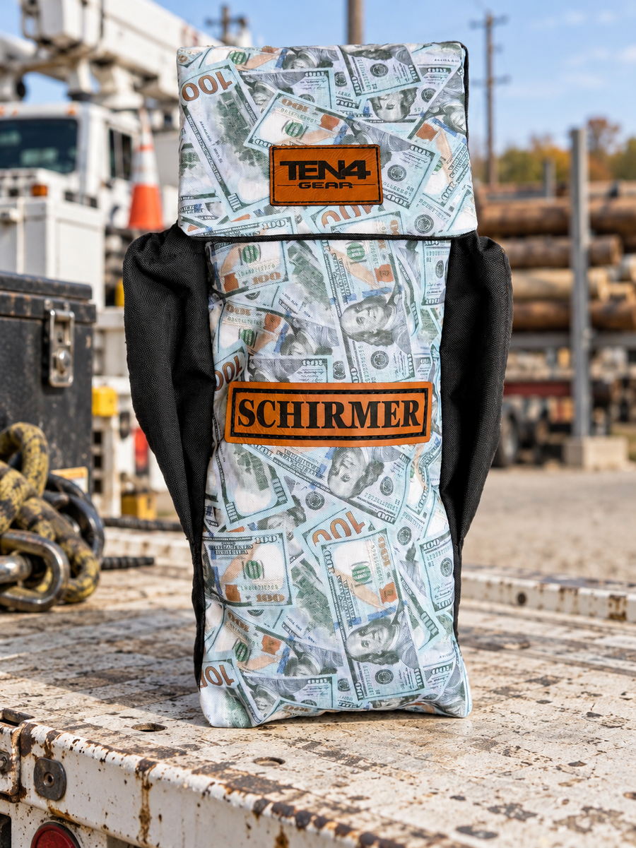 Blue Strips money-print Utility bag with flat Velcro flap and two side pockets on a utility-truck tailgate; original bag photo with edited background.