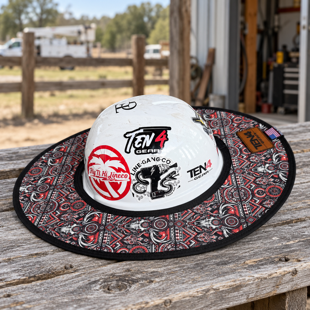 Cowboy sunshade on a white hard hat resting on a rustic bench beside a utility workshop