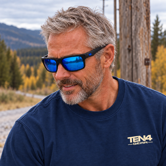 Lifestyle model mockup wearing Z87+ FullViz Deep Blue with TEN4 apparel outdoors.