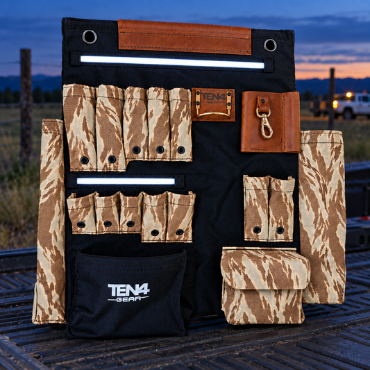 Desert Tiger Stripe 24-inch TEN4 G Board with white LED glow at an outdoor utility worksite