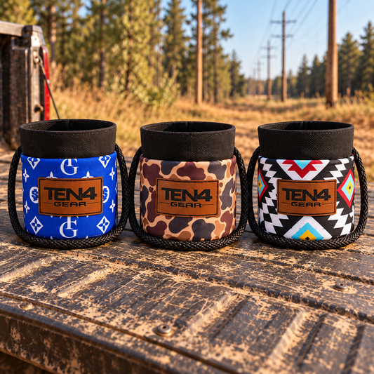 Grunt Stack pack of three small Grunt Sacks in TG Royal, Duck Camo and Tomahawk on an outdoor truck tailgate