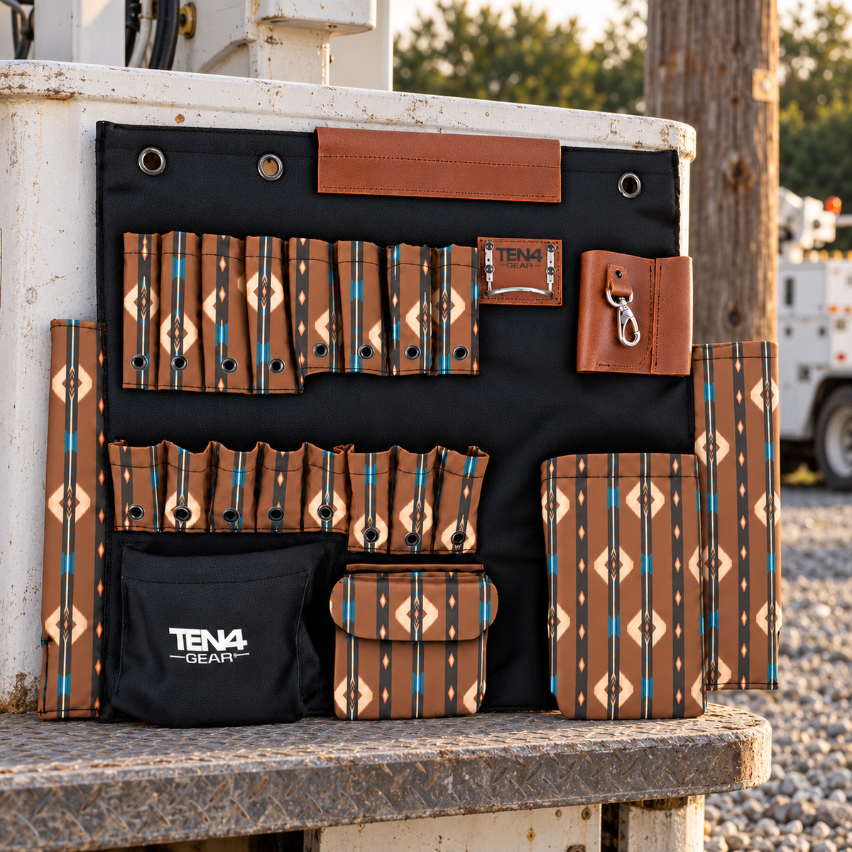RanchHand 32-inch TEN4 Tool Board on a bucket-truck platform beside a wooden utility pole.