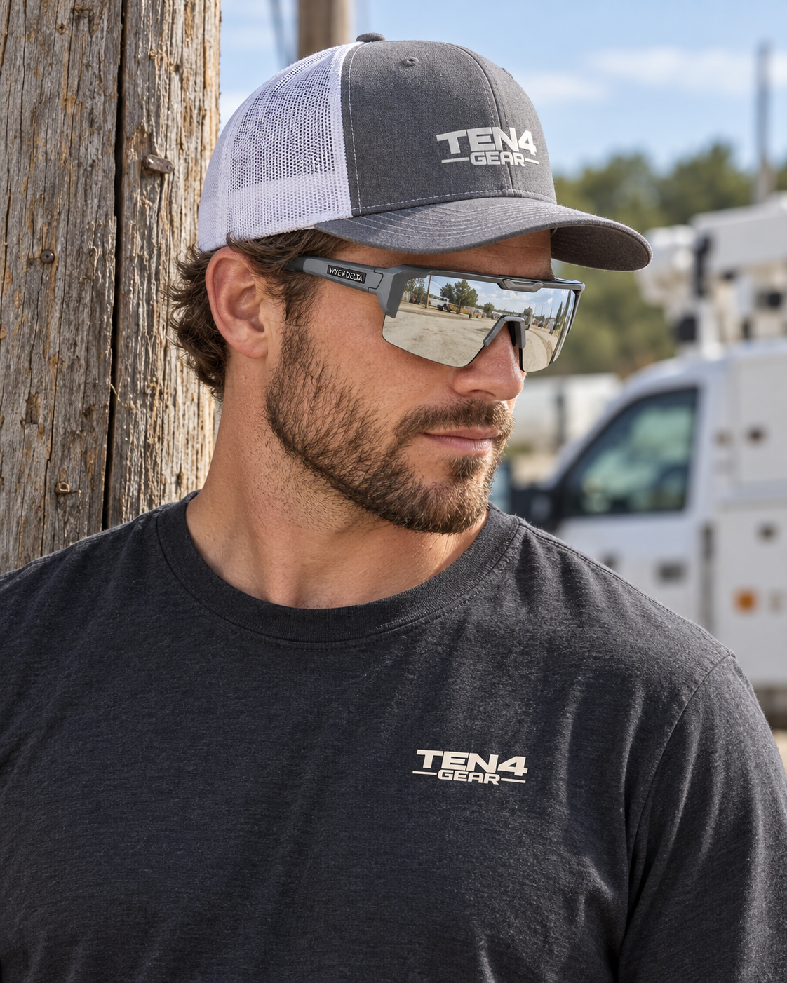 Lifestyle model mockup wearing Z87+ REACTIV Phantom and TEN4 apparel outdoors.