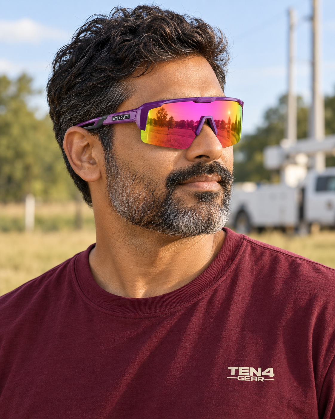 Lifestyle model mockup wearing Z87+ REACTIV Spectrum and TEN4 apparel outdoors.