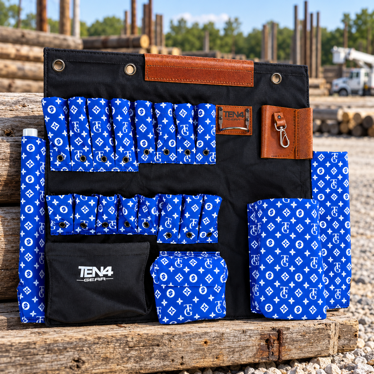 TG Royal 32-inch TEN4 Tool Board in royal blue and white, displayed in an outdoor utility pole yard.