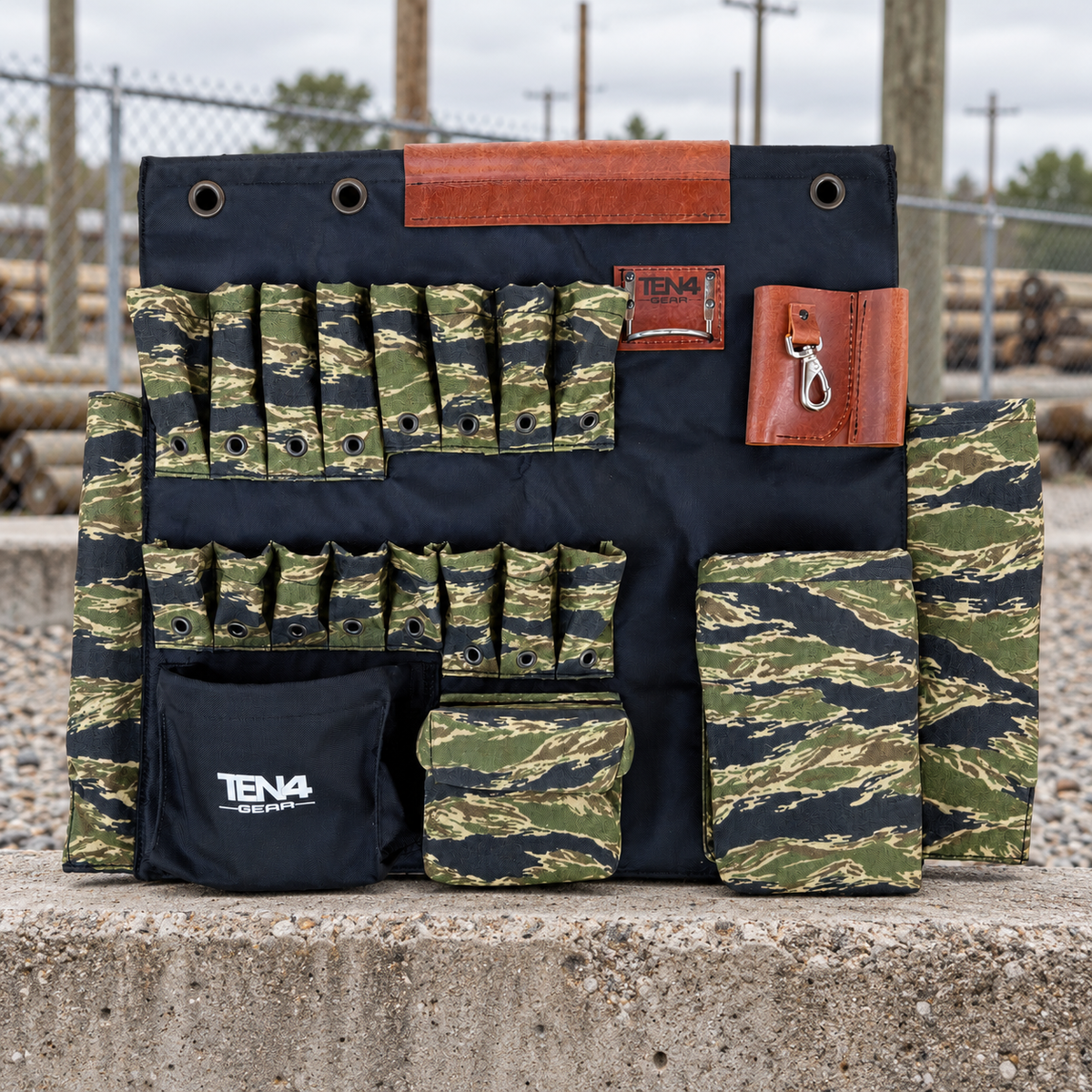 Tiger Stripe 32-inch TEN4 Tool Board in an outdoor utility pole storage yard