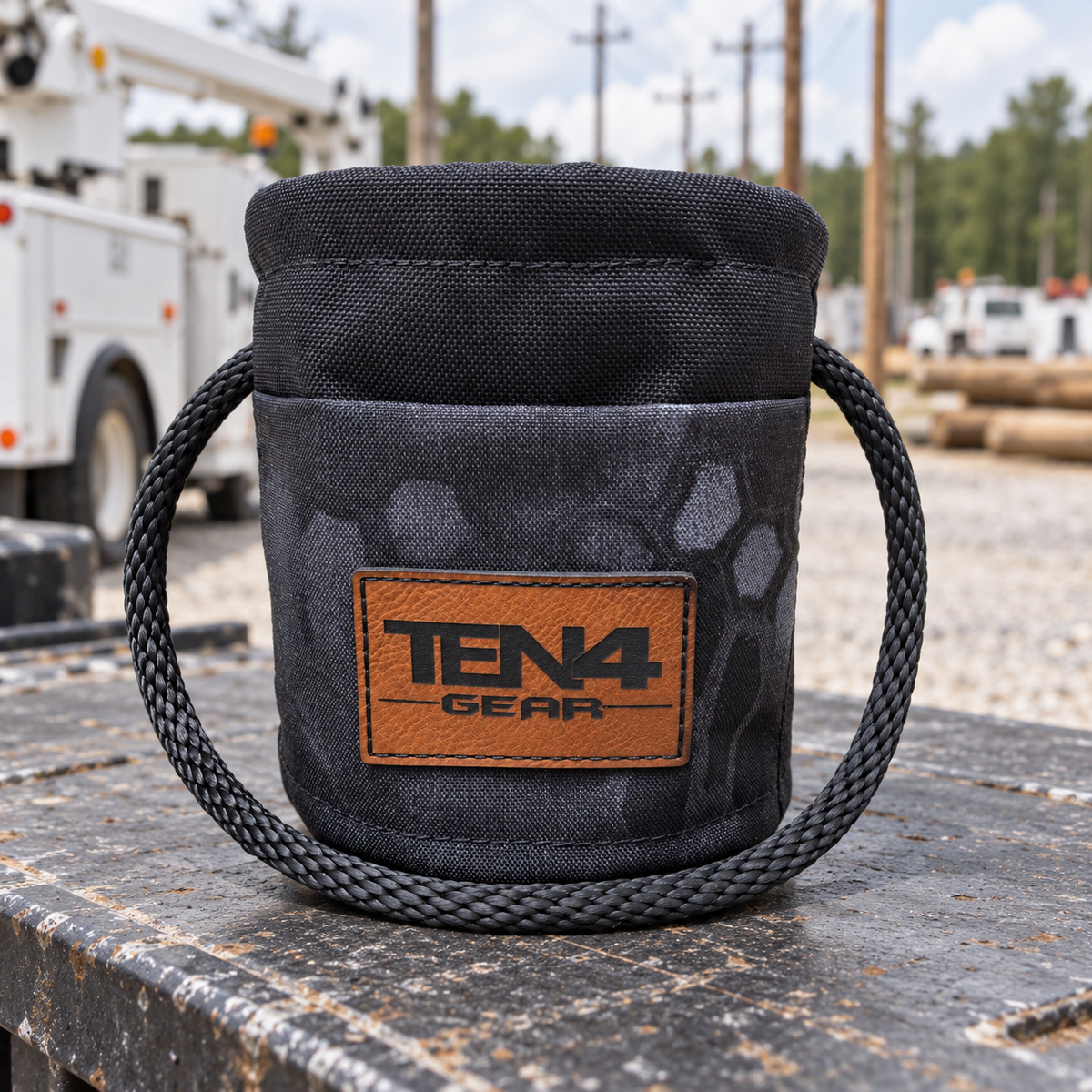Typhon Grunt Sack with current TEN4 patch on a utility truck at a linework site