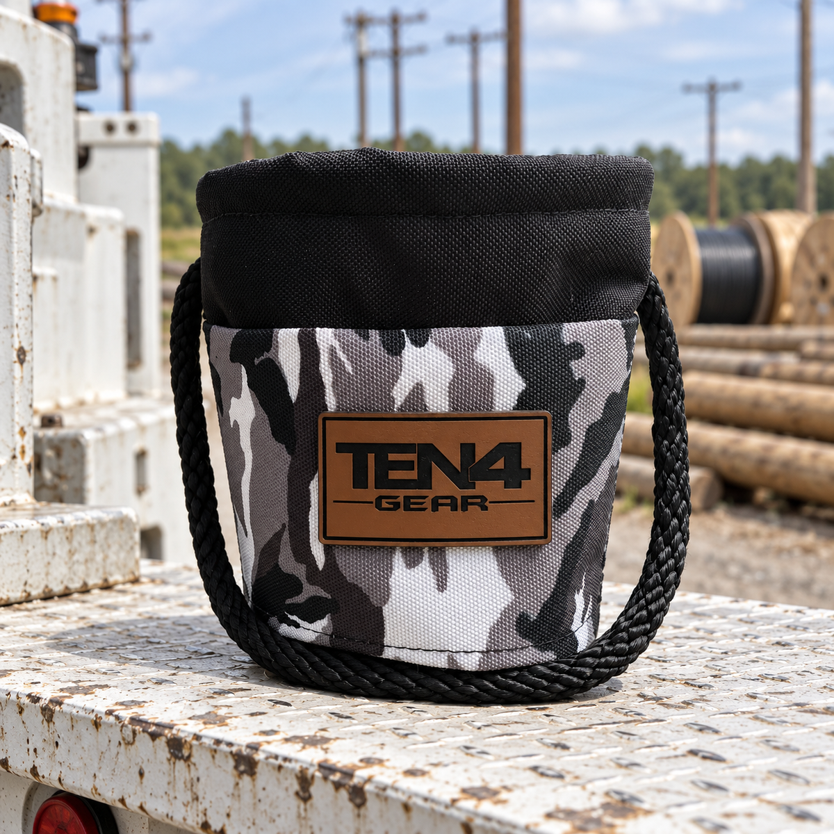 Urban Camo Grunt Sack with current TEN4 patch on a utility truck at a linework site